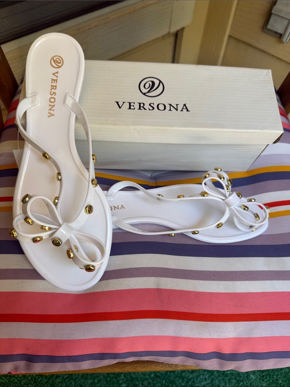 Versona White Jelly Bow Slide Sandals with Gold Stud Accents